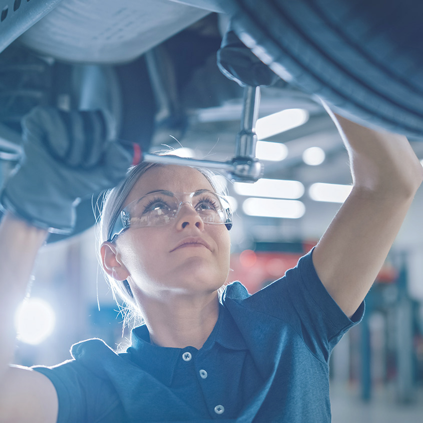 Mechanic working on vehicle